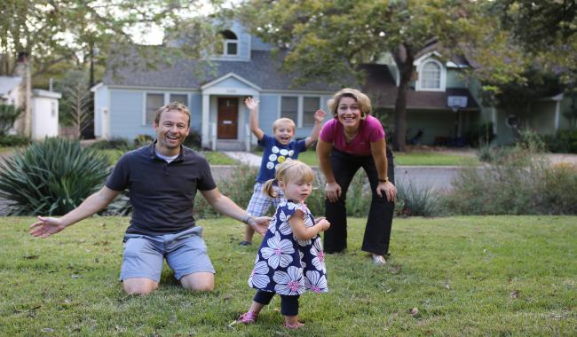 Family playing in yard