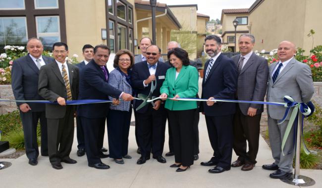 City officials at ribbon cutting ceremony for Taylor Yard grand opening.