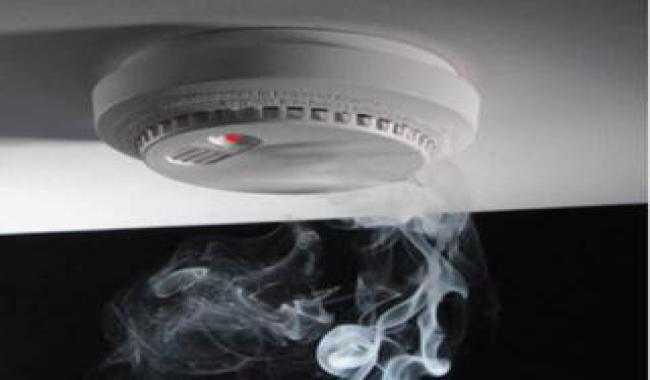 Smoke raising towards a smoke detector